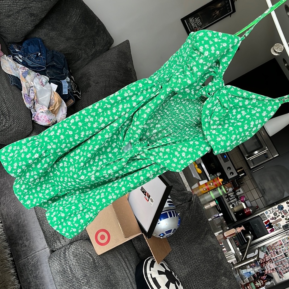 Blu Pepper grease floral dress. Front ties in two places as seen in photo.